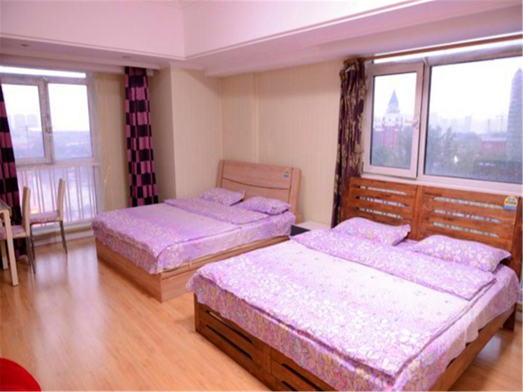 Green Express Apartment Harbin West Railway Station Харбин Номер фото